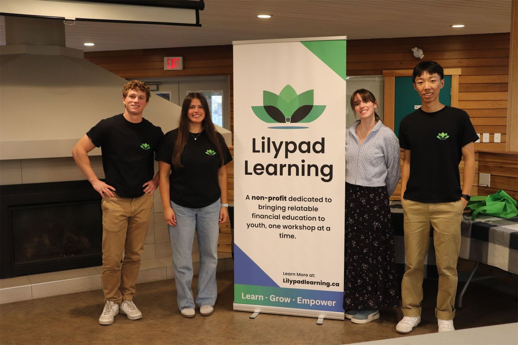 The Lilypad Learning team standing together in matching black shirts